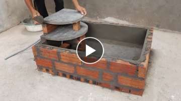 Build a beautiful outdoor aquarium from red bricks and cement